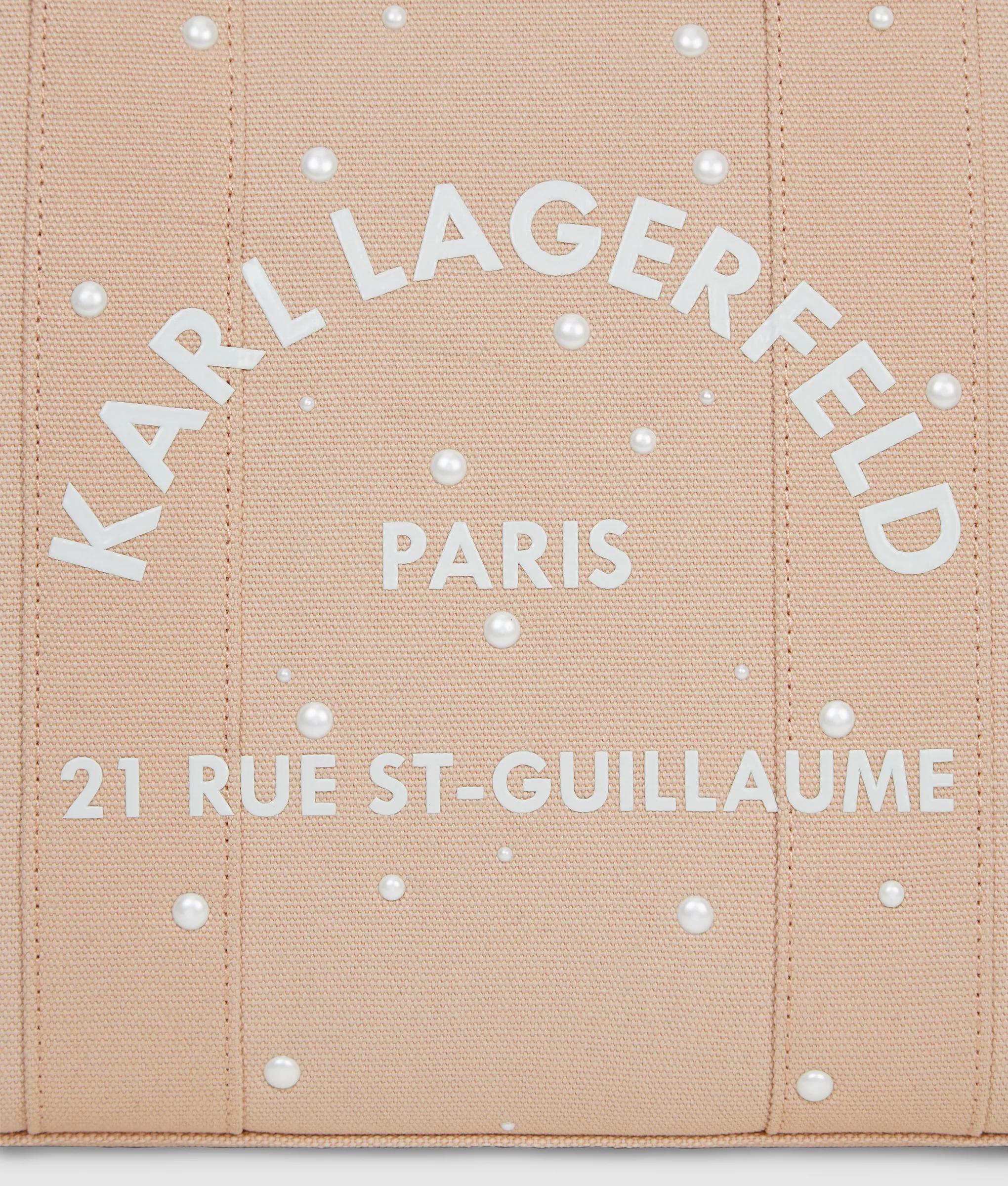 Rue St-Guillaume draagtas van imitatieparels van gemiddelde grootte