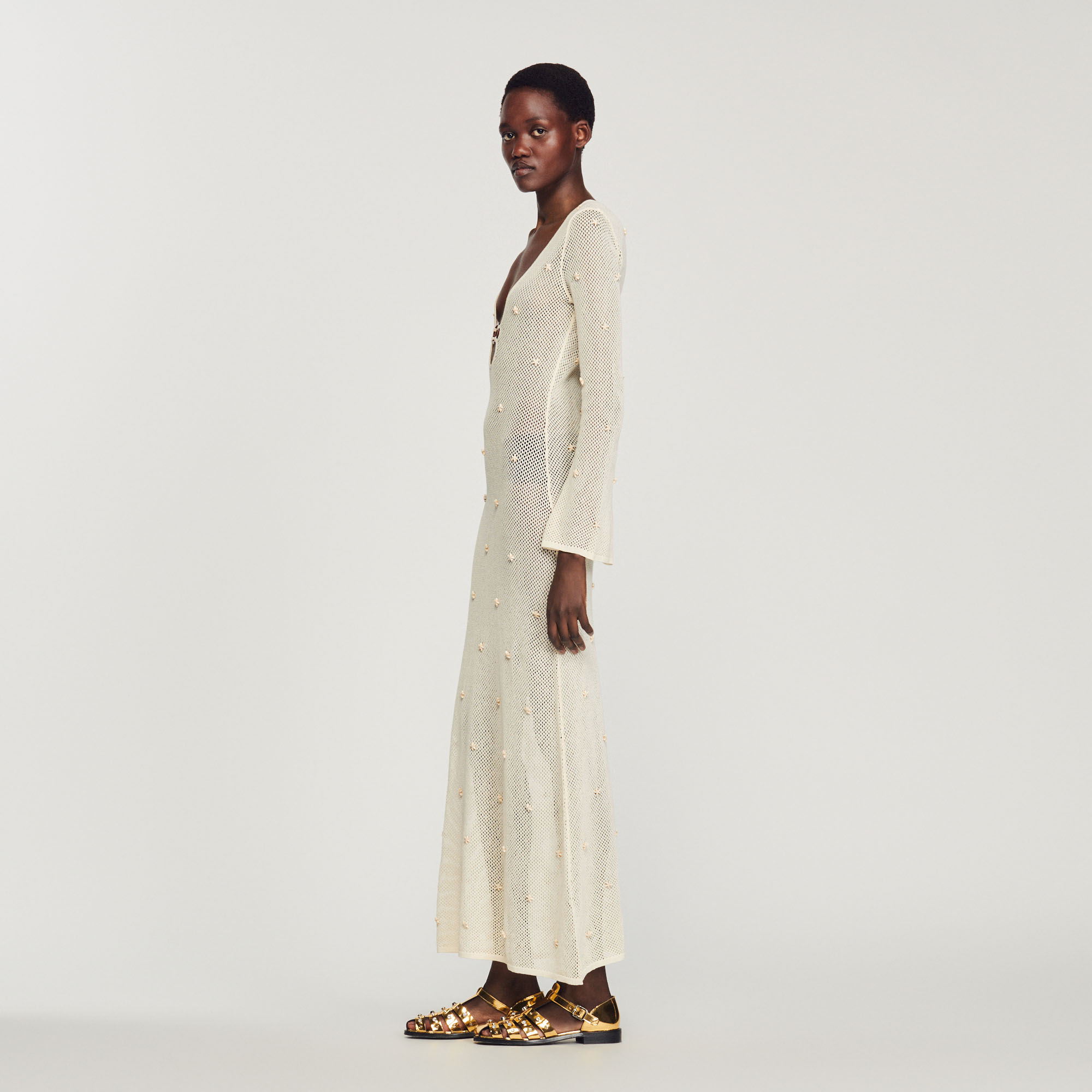 Robe longue en resille á pampille
