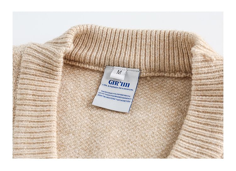 Shineon Studio - V-hals vest met geborduurde beer en zakdetail