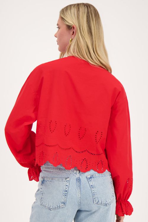 Rode blouse met strikjes en broderie