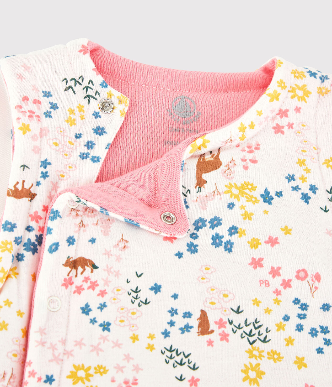 Gilet sans manches réversible bébé fille en coton biologique ouatiné