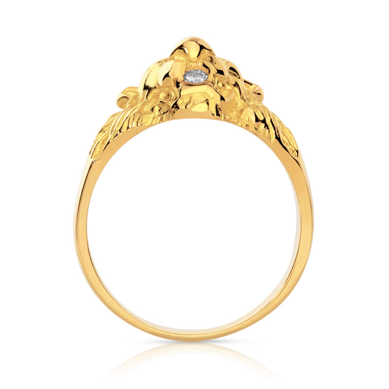 Chevalière or 750 jaune tête de lion rubis et diamant