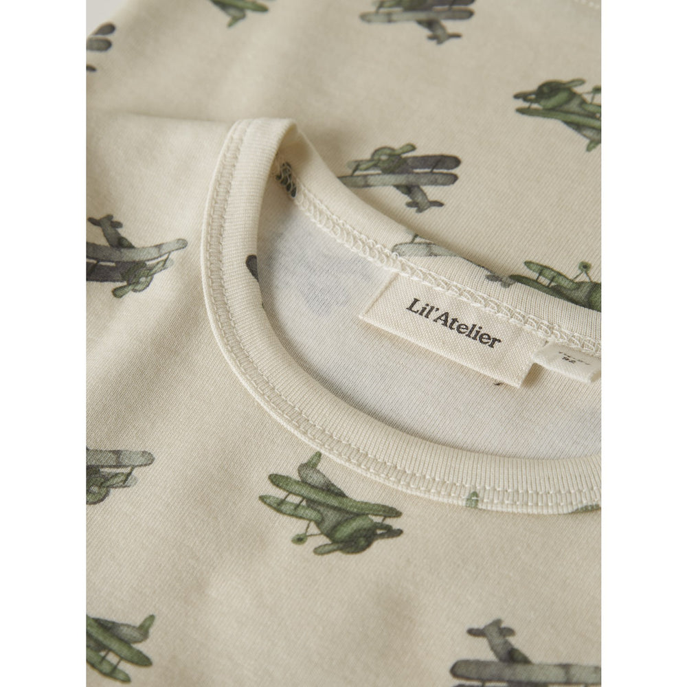 Køb Lil'Atelier Coconut Milk Airplane Nmmlayo Geu Ls Slim Top Lil