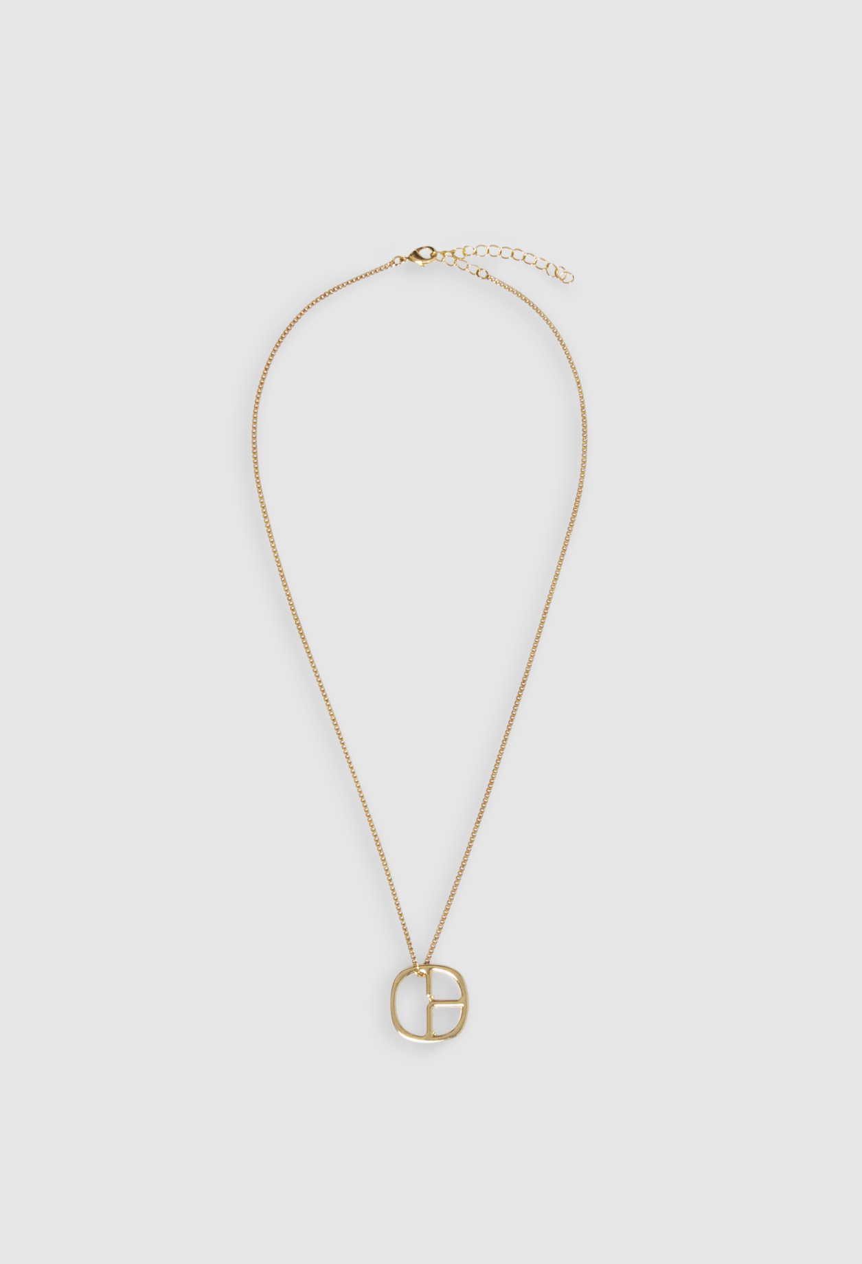 Collier pendentif monogramme dore