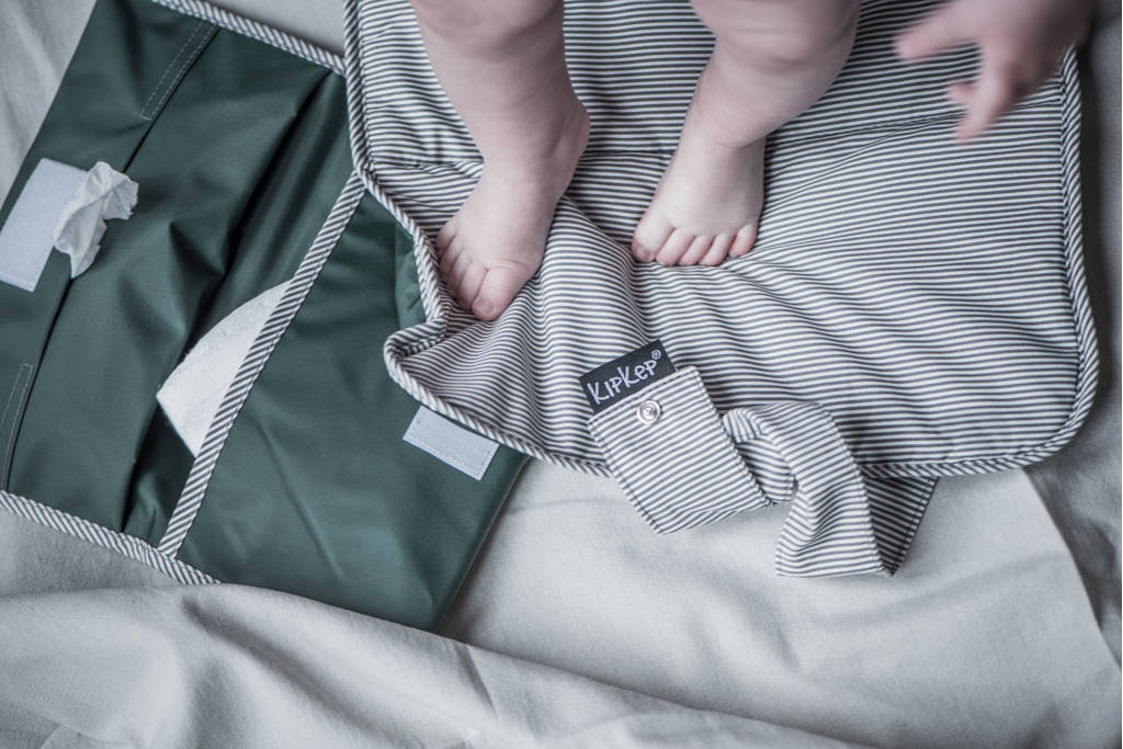Napper verschoningsmatje + luieretui calming green