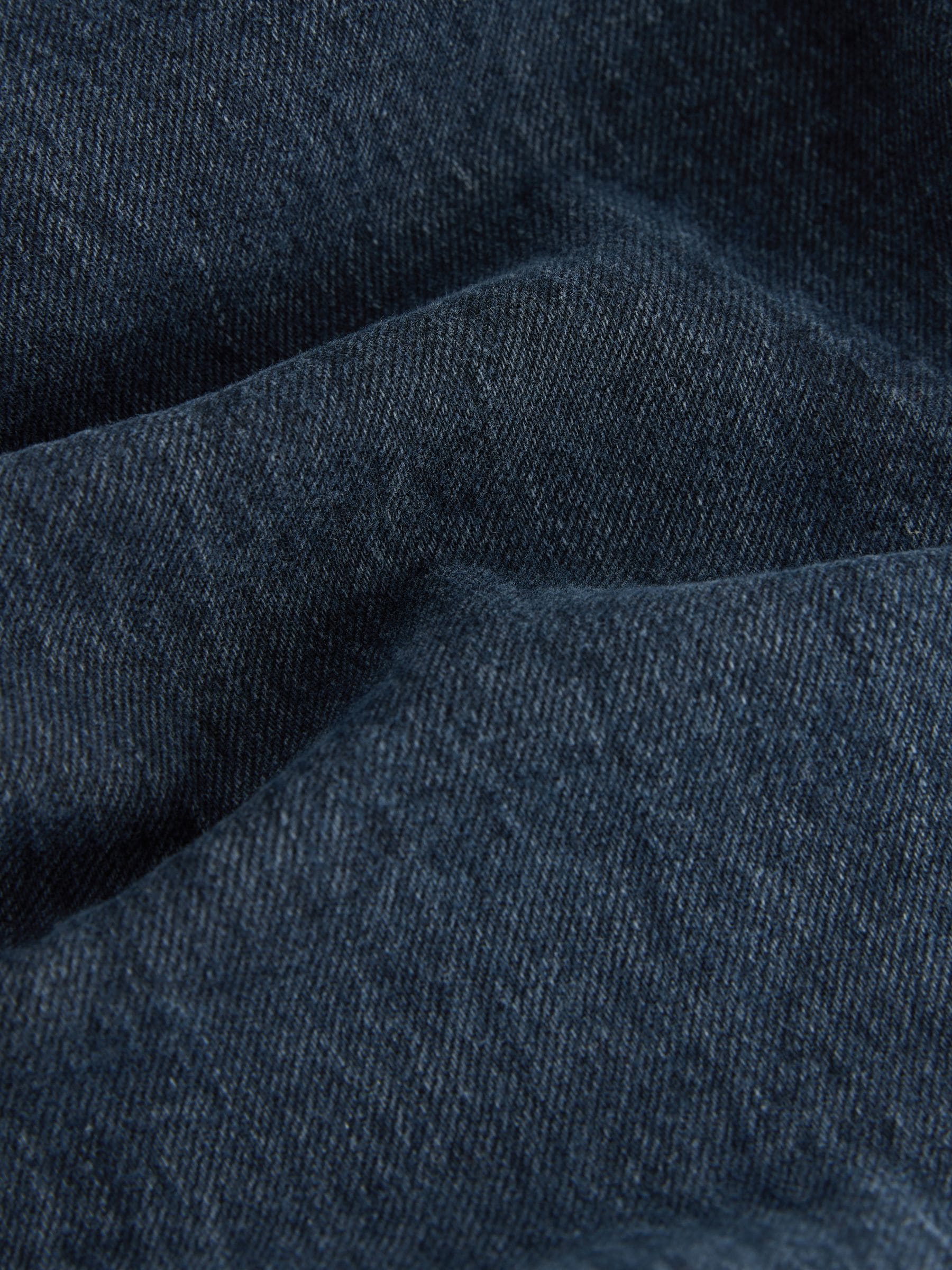 Mediumblauw getint - Relaxte uitlopende pasvorm - Vintage wash denim jeans