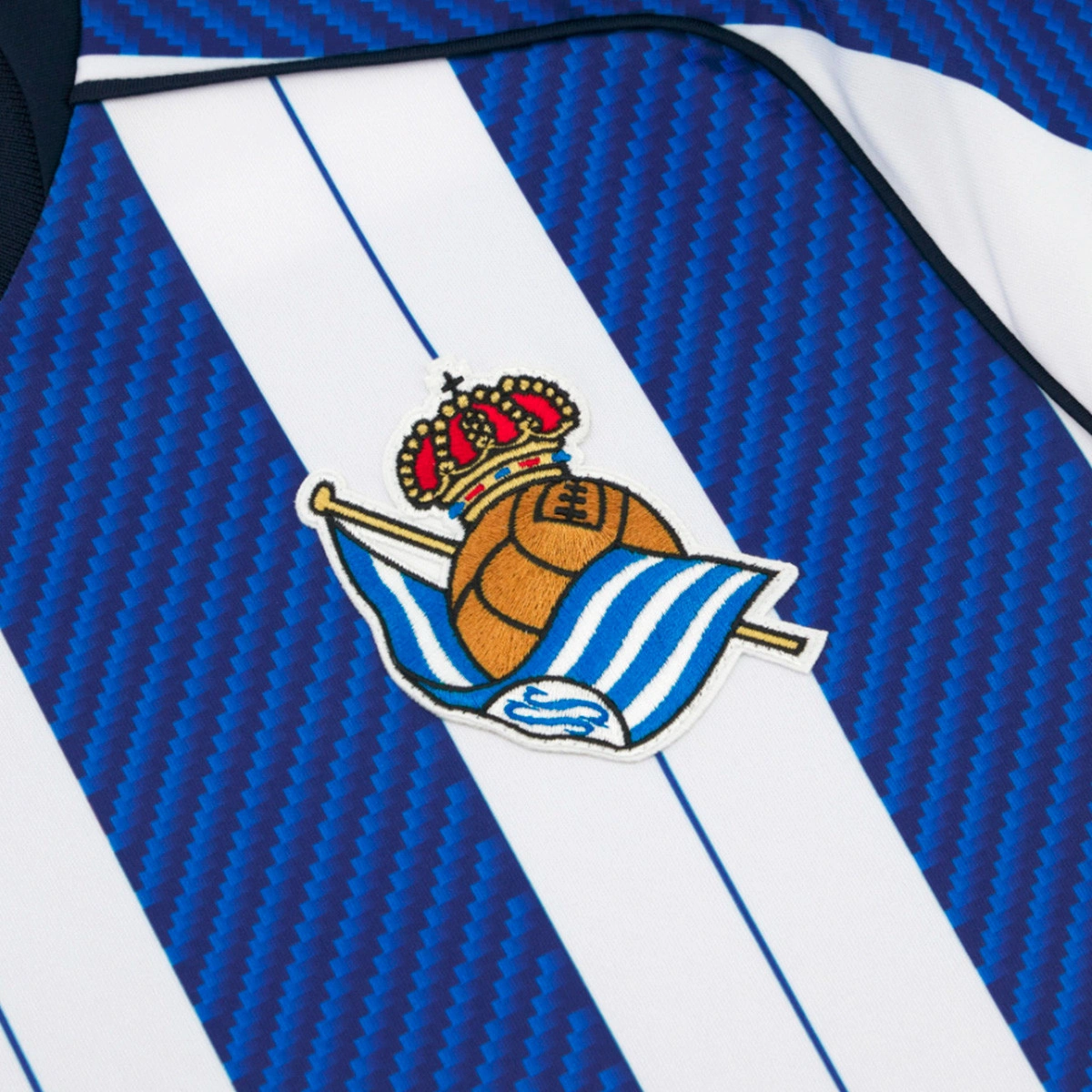 Camisola Macron Real Sociedad Primeiro Equipamento 2025-2026 Criança