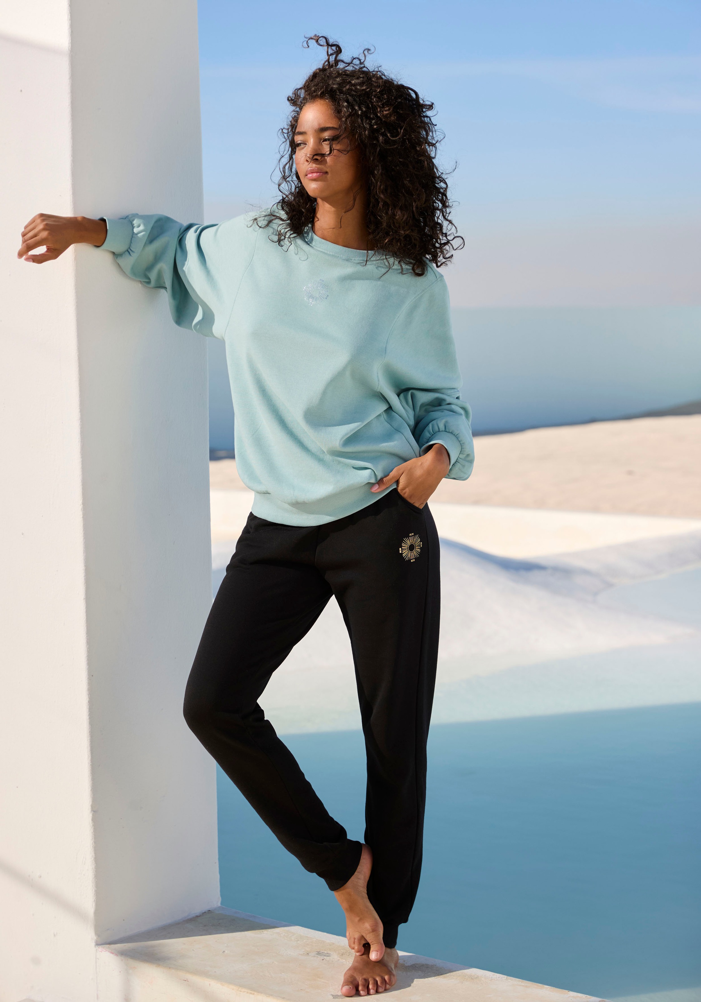 Buffalo Sweathose  Loungehose mit seitlichen Taschen und kleinem Druck, Loungewear