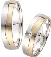 Trouwringen geel en witgoud met Diamant breedte 5 mm