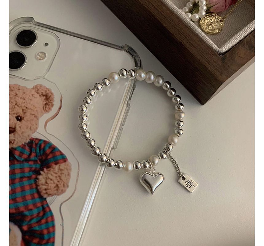 Catharsis - Hartvormige armband van imitatieparels