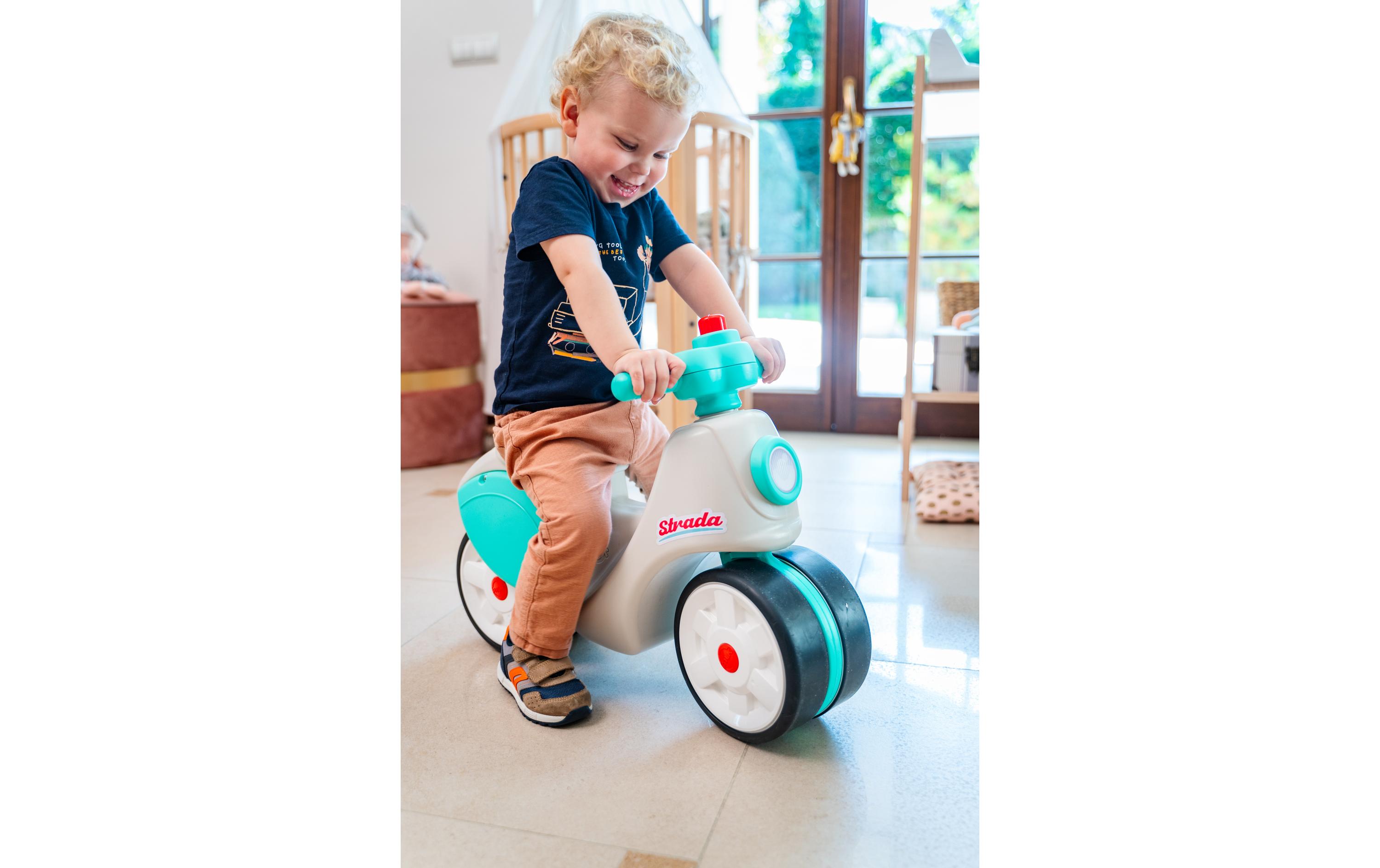 Rutschfahrzeug Strada Early Years ScooterScooter mit geräuscharmen Rädern, Lenker mit Richtungsanzeige und Hupe