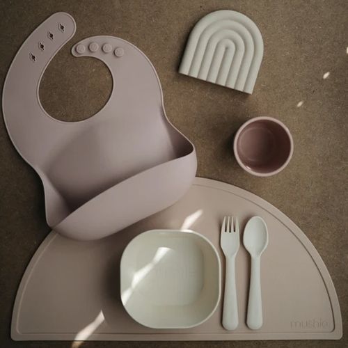 Mushie placemat shifting sand