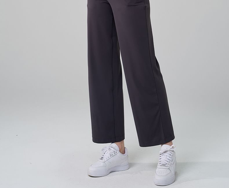 Arigne - Sporttop met lange mouwen en ronde hals en effen cropped pasvorm