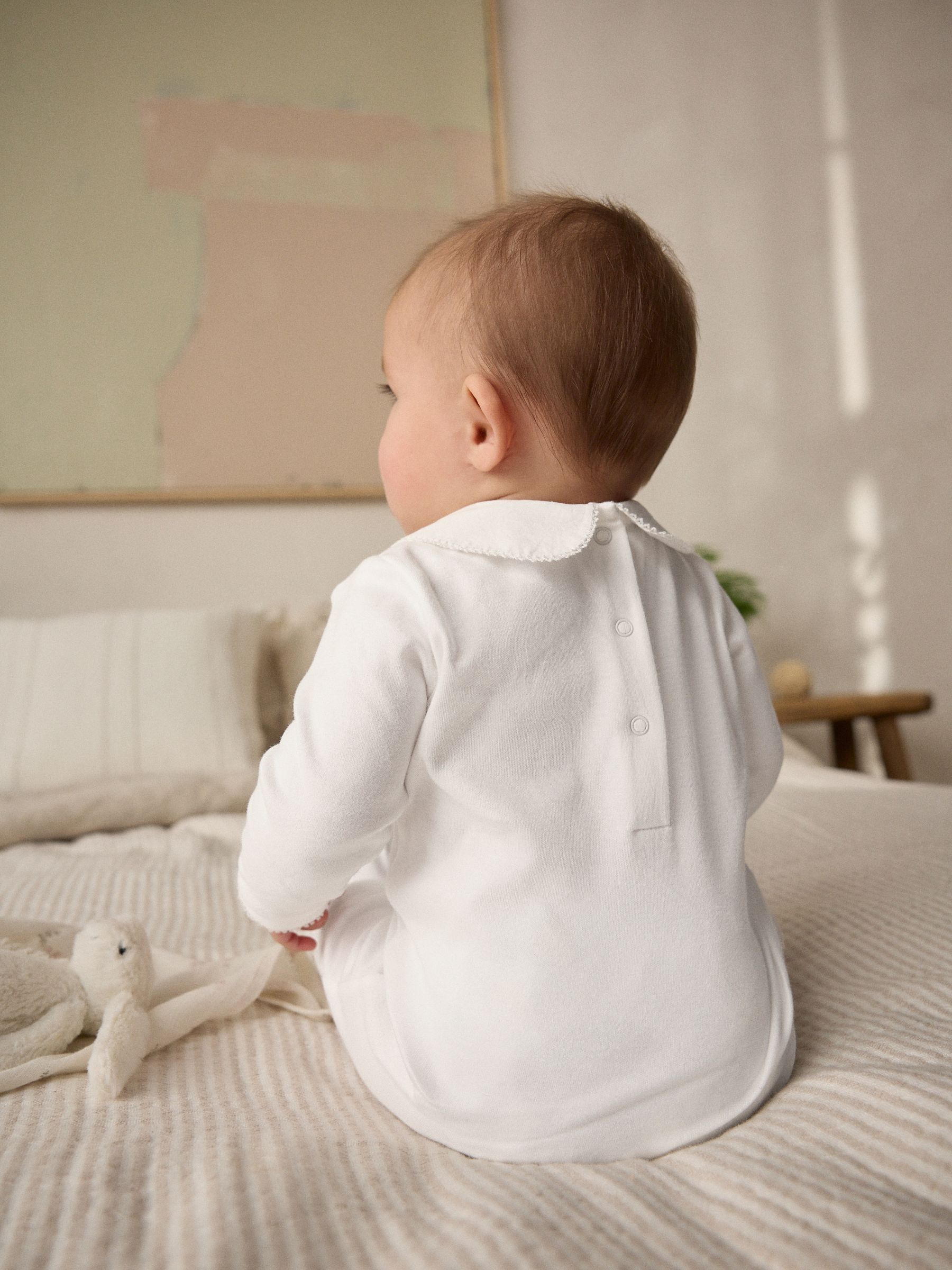 Wit - Feestelijke babyslaapzak (0mnd-2jr)