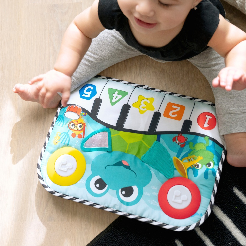 Baby Einstein Ocean Explorers Neptune's Kick & Explore Musikalisches Trittkissen & Babybettspielzeug