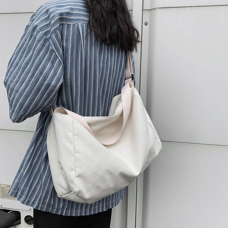 EAVALURE - Effen canvas crossbodytas met rits