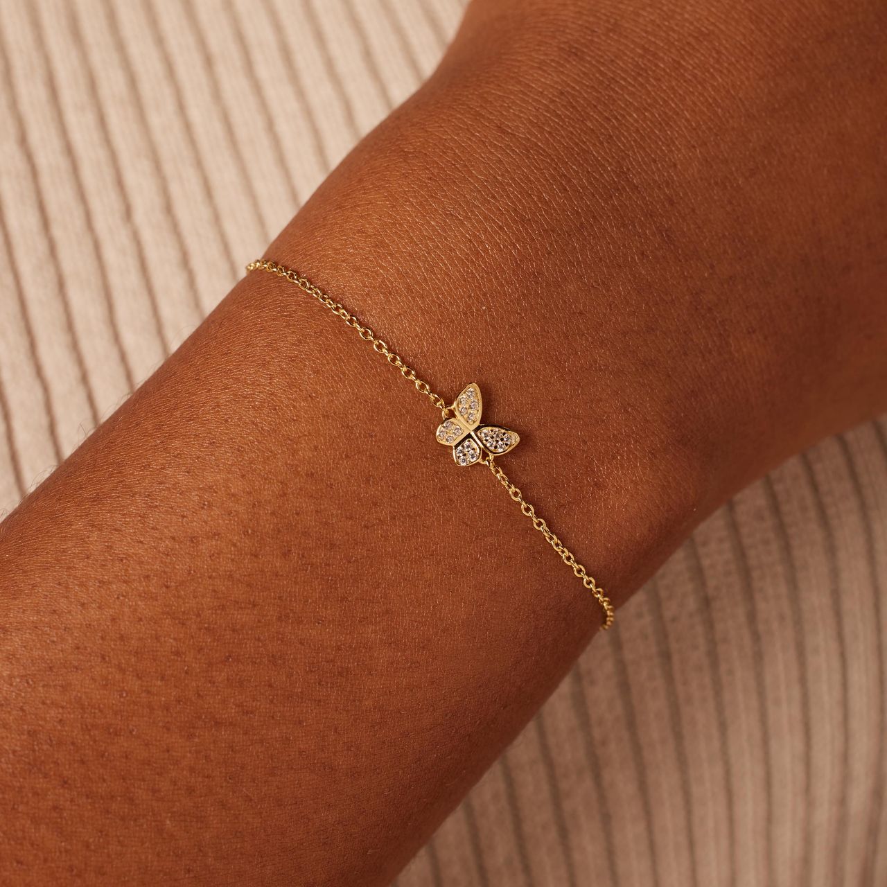 Zilveren goldplated armband vlinder zirkonia
