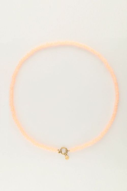 Oranje kralenketting met slotje