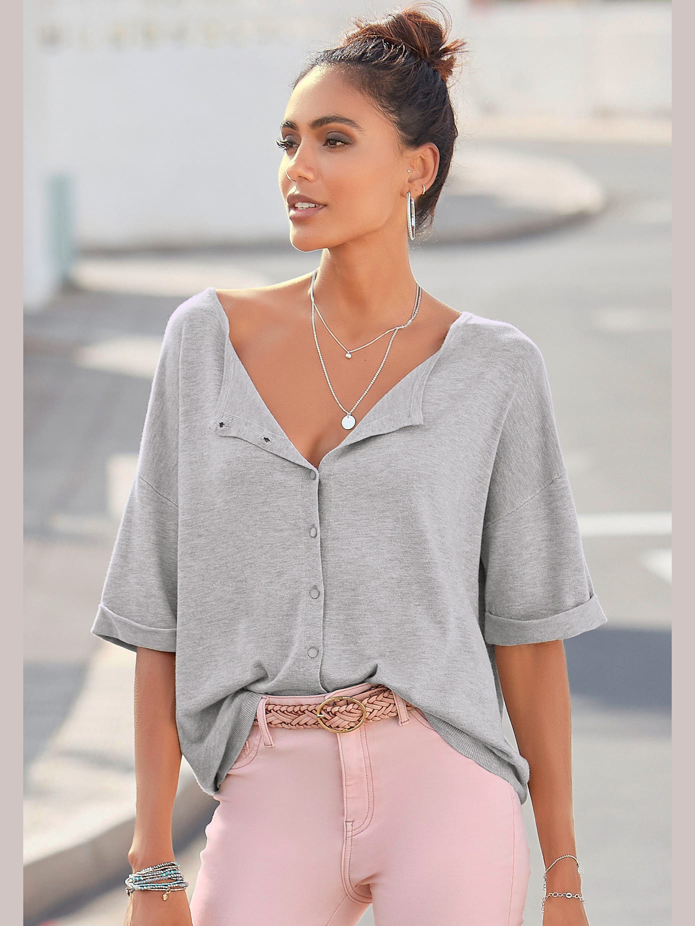 Pull à manches courtes patte de boutonnage au dos