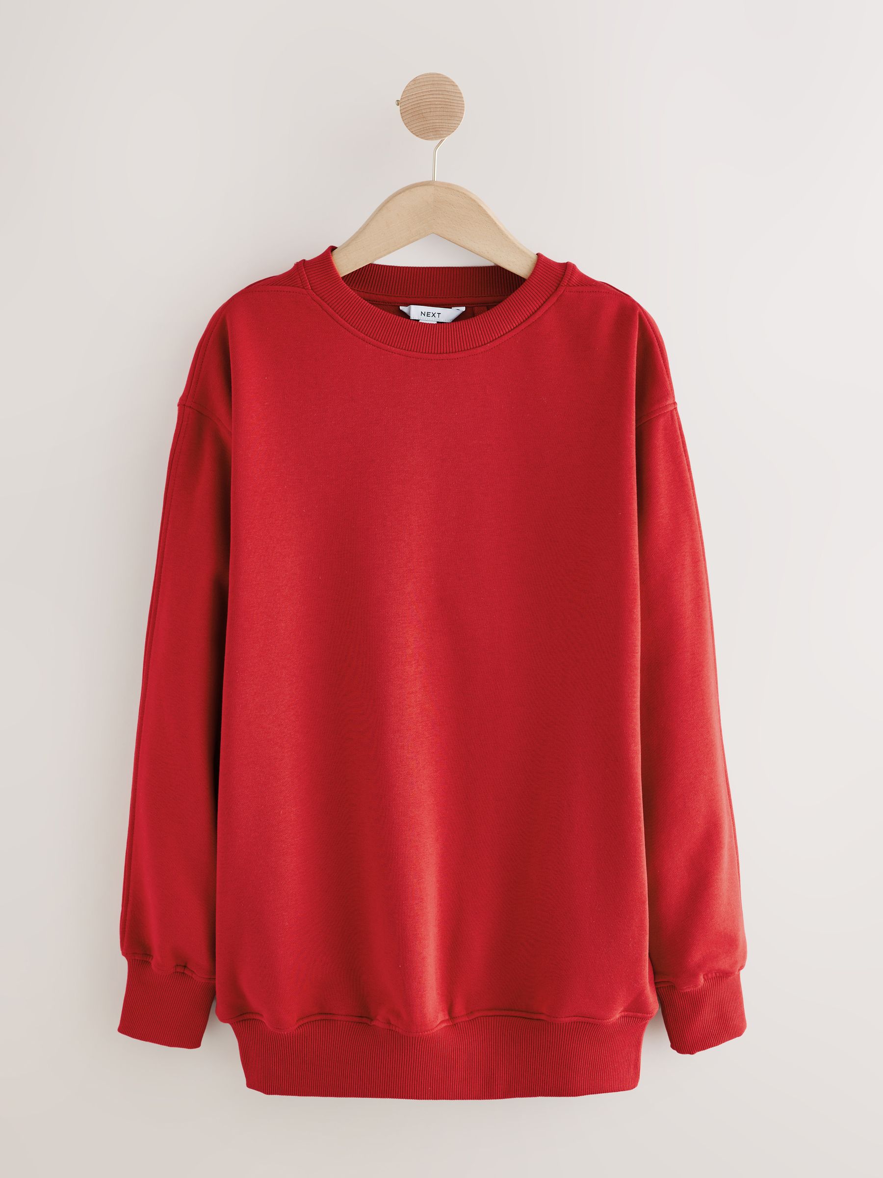Kersrood - Essentials sweatshirt met relaxte pasvorm, lange snit en zakken