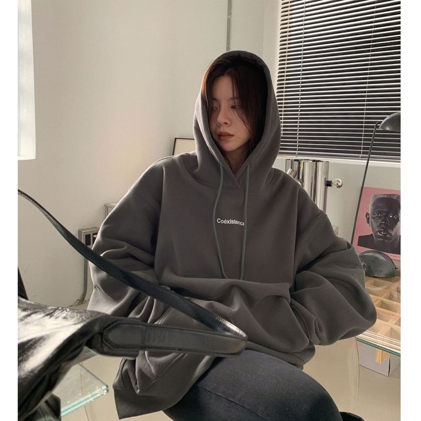 CRIBI - Oversized hoodie met ronde hals en tekstprint