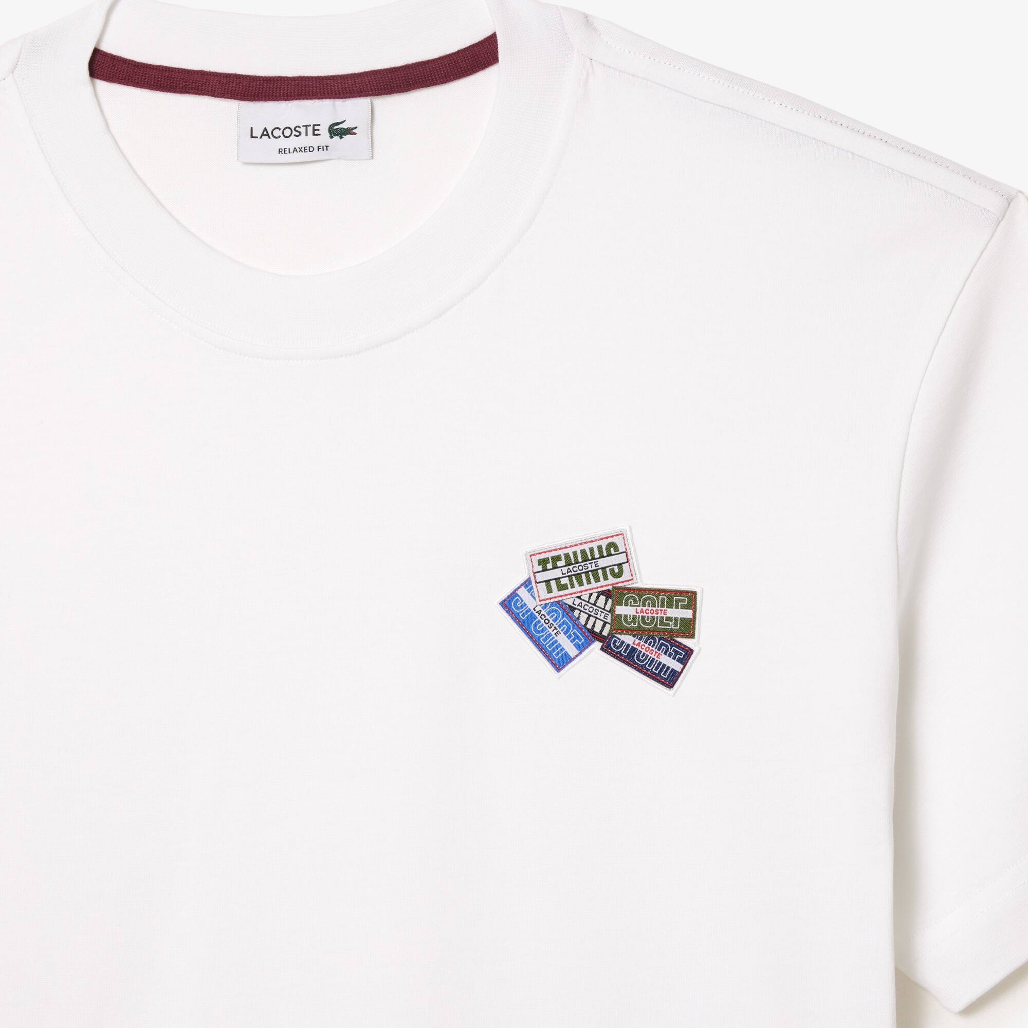 T-Shirt aus robustem Baumwolljersey mit vielen Aufnähern. T-Shirts - Weiss - Lacoste - Herren