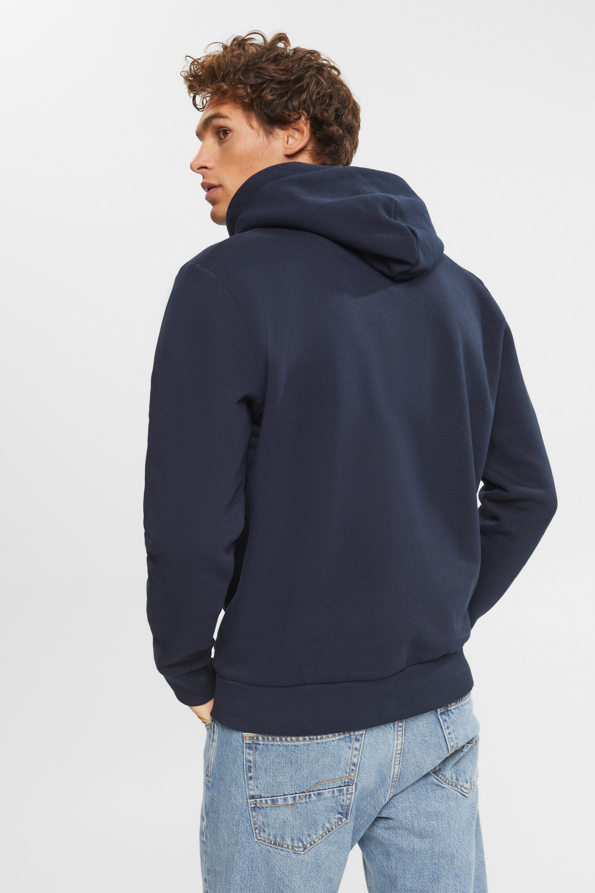 En matière recyclée le sweat à capuche à logo brodé