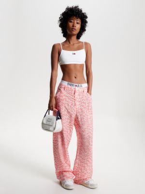 Top cropped ultra com amarração nas costas e distintivo