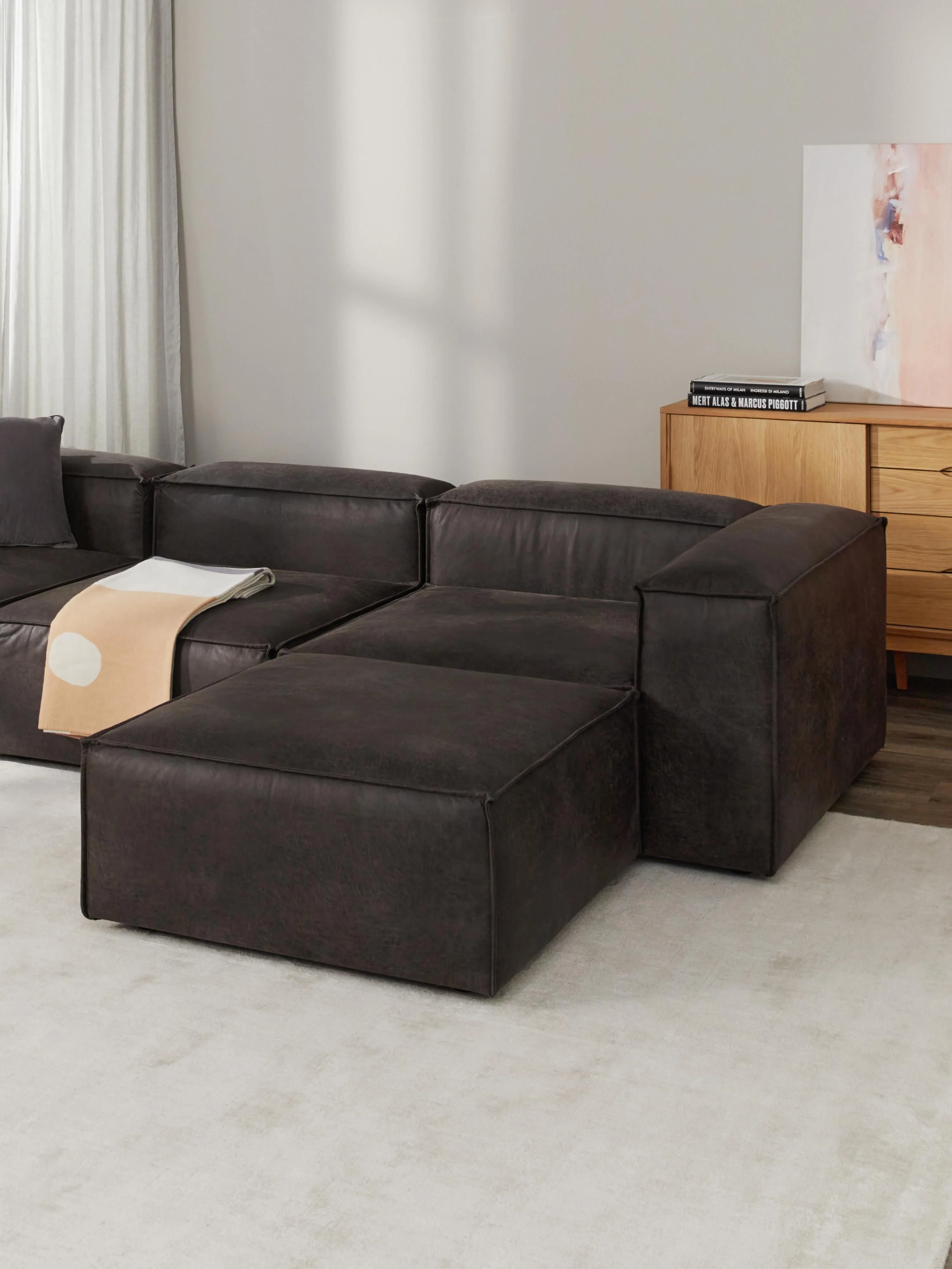 Modulaire bank Lennon (4-zits) van gerecycled leer met poef (links/rechts)