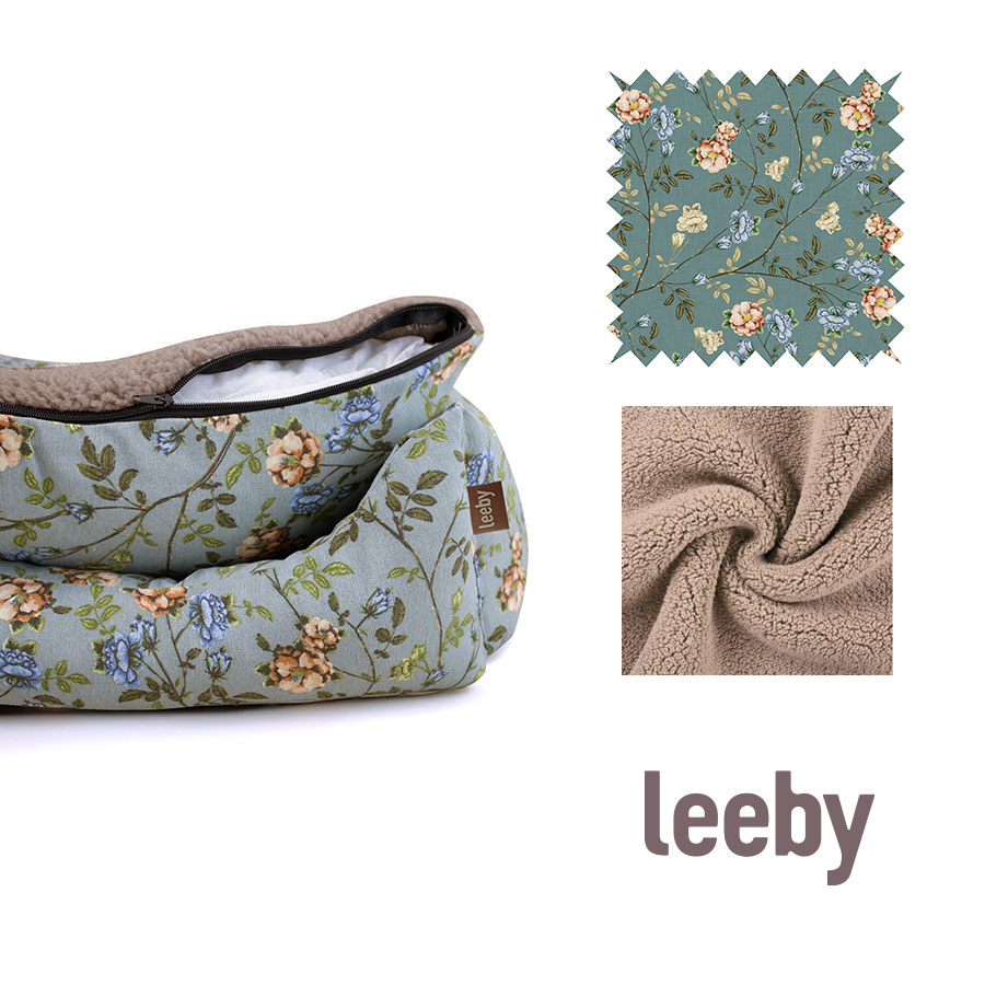 Cama para cães Leeby com capa removível e estampa floral turquesa.