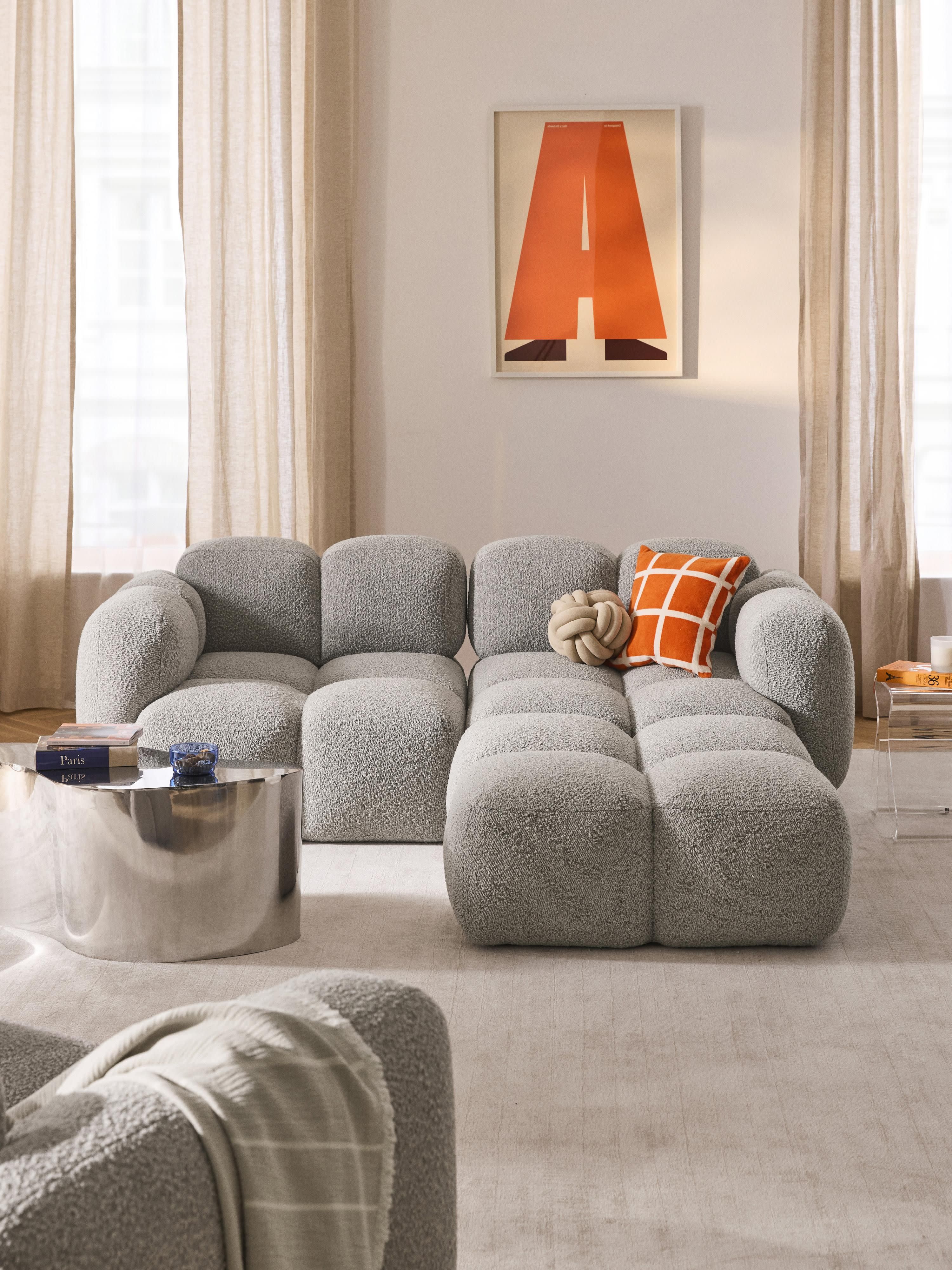 Modulaire bank Tayla (3-zits) van bouclé met poef (links/rechts)