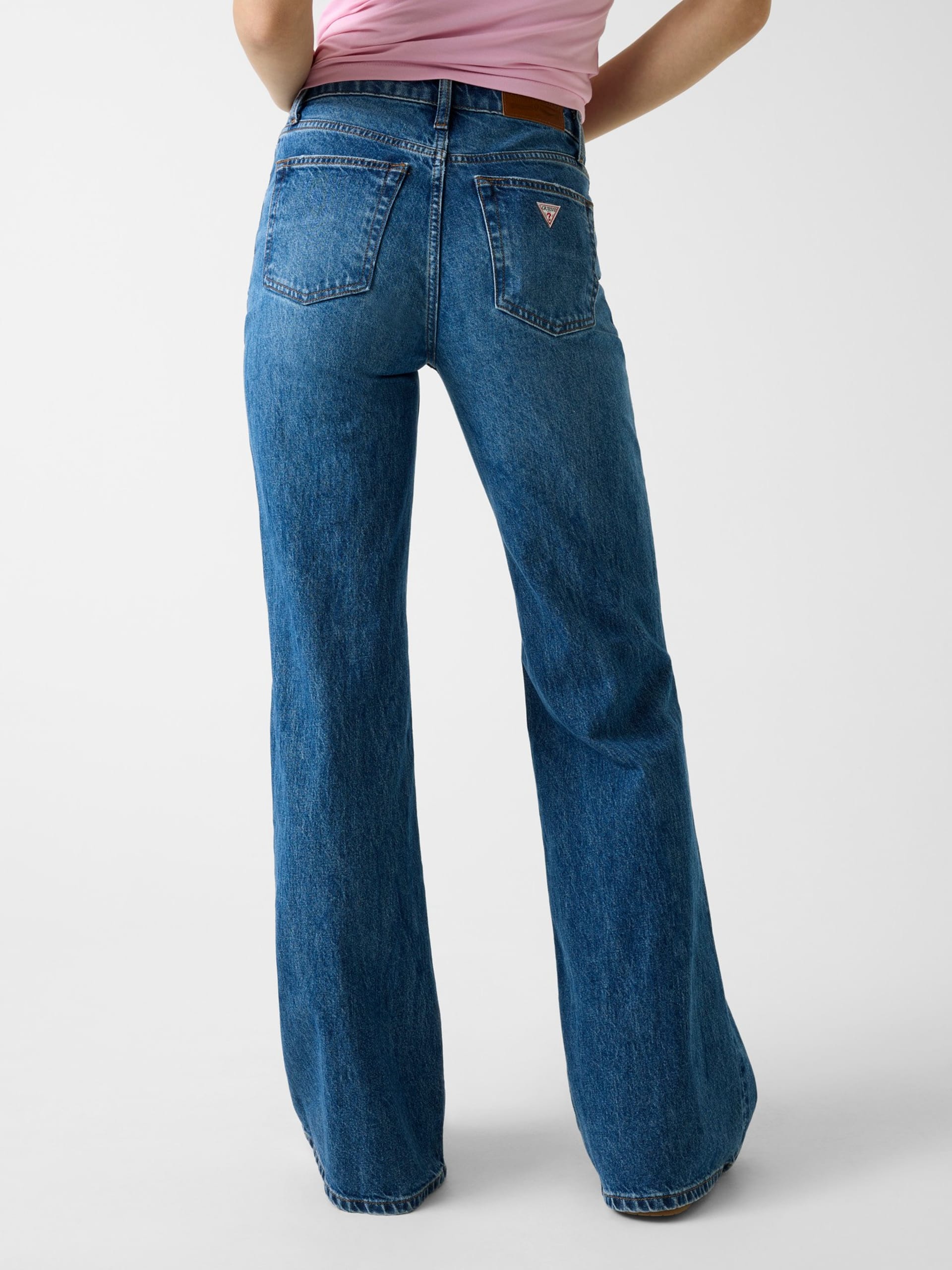 calças jeans flare de cintura alta