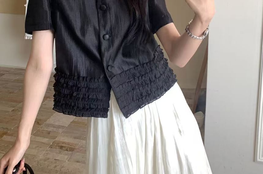 ISSOL - Mouwloze blouse met ronde hals en effen volant