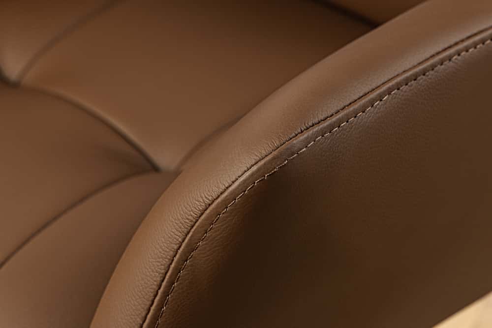 Drehbarer Stuhl SIGNATURE cognac braun Echtleder 360° Taschenfederkern schwarz Metall