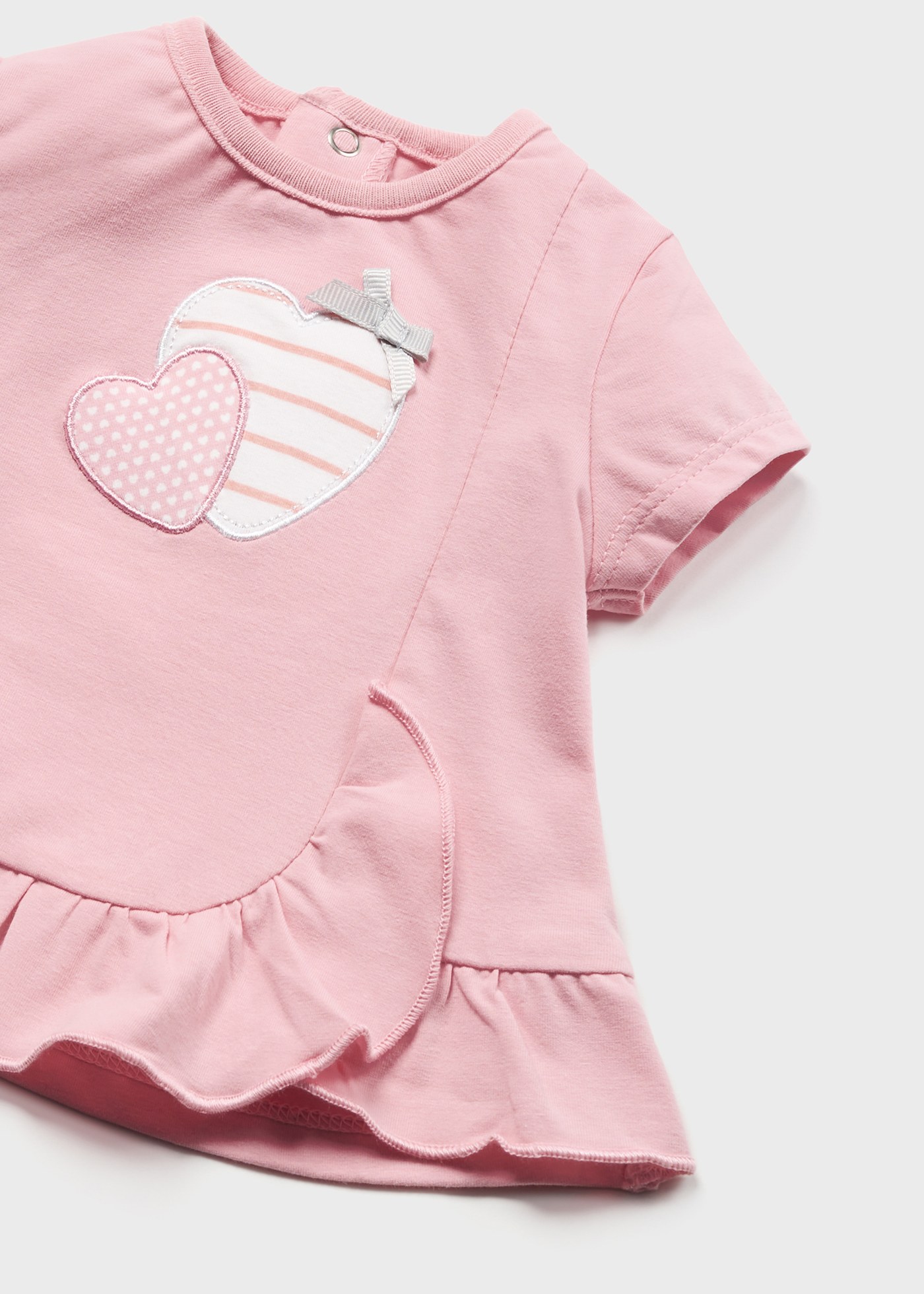 Conjunto de 4 peças em algodão sustentável para recém-nascidos.
