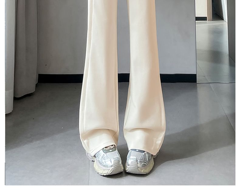 Tel tot 10 - Effen wijd uitlopende broek met trekkoord in de taille (verschillende ontwerpen)