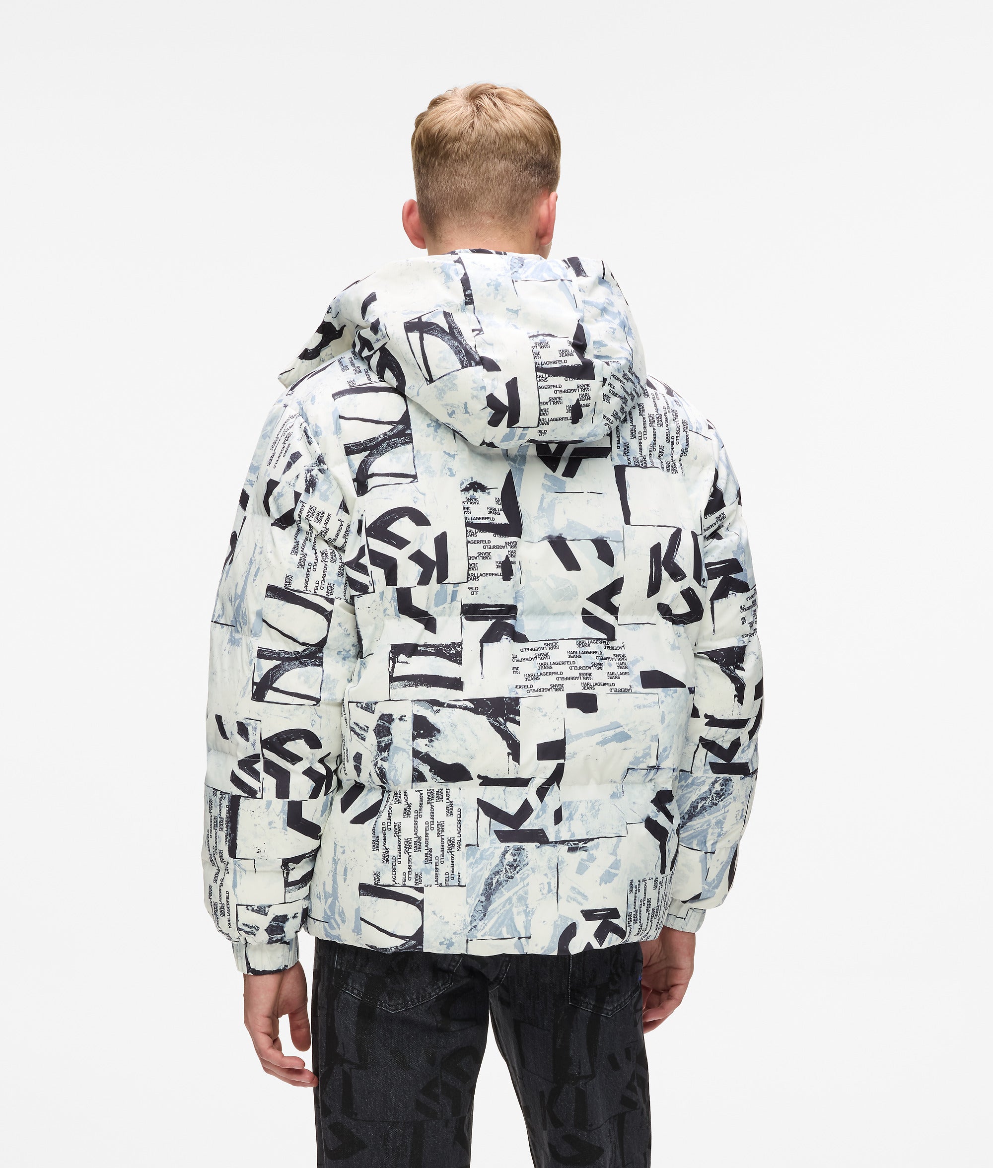 Pufferjack met Monogram over de hele jas