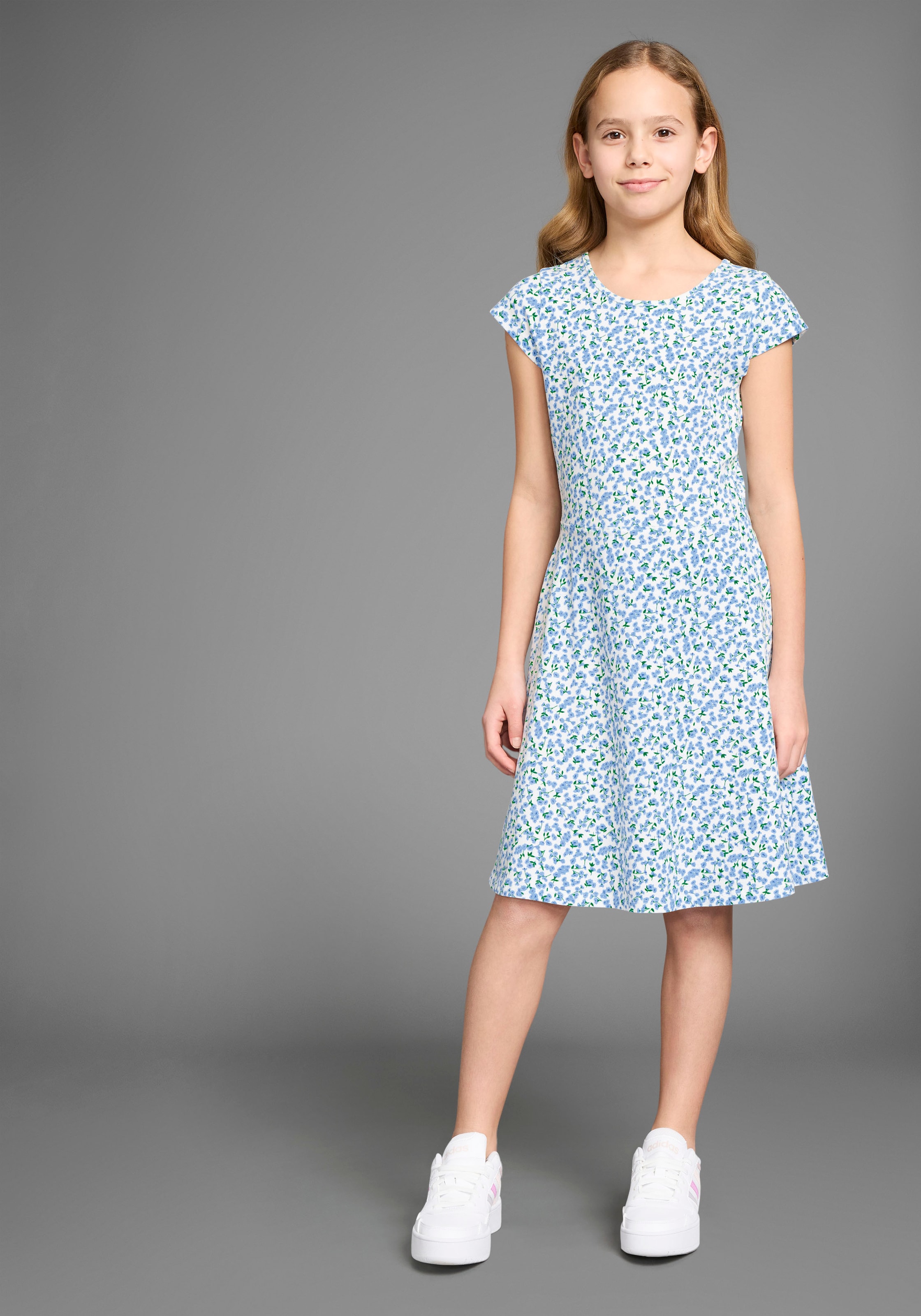 KIDSWORLD Jerseykleid »Skaterkleid in Allover-Design« Ohne Taschen weich fallendes Jersey-Kleid