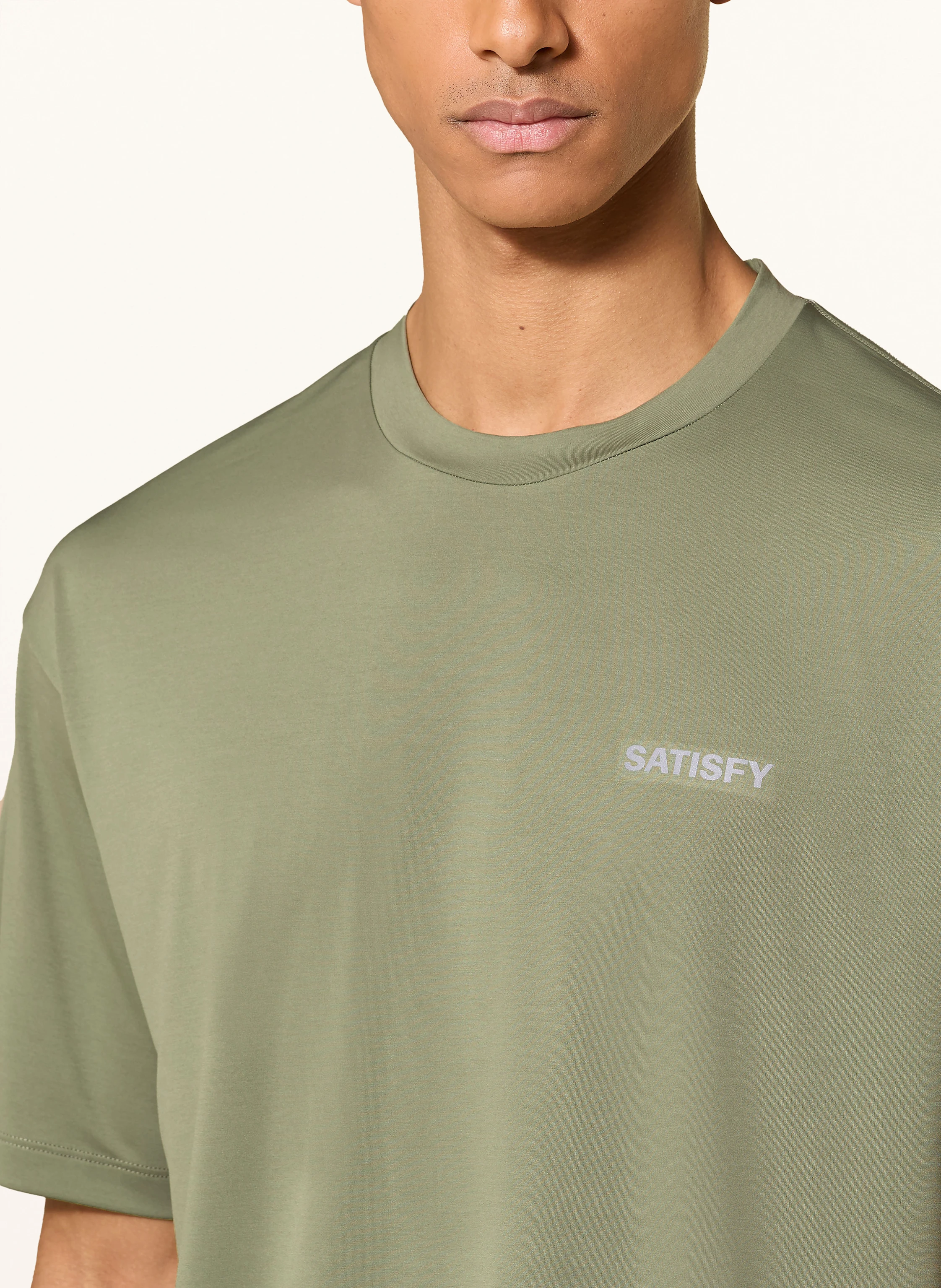 SATISFY Laufshirt AURALITE™