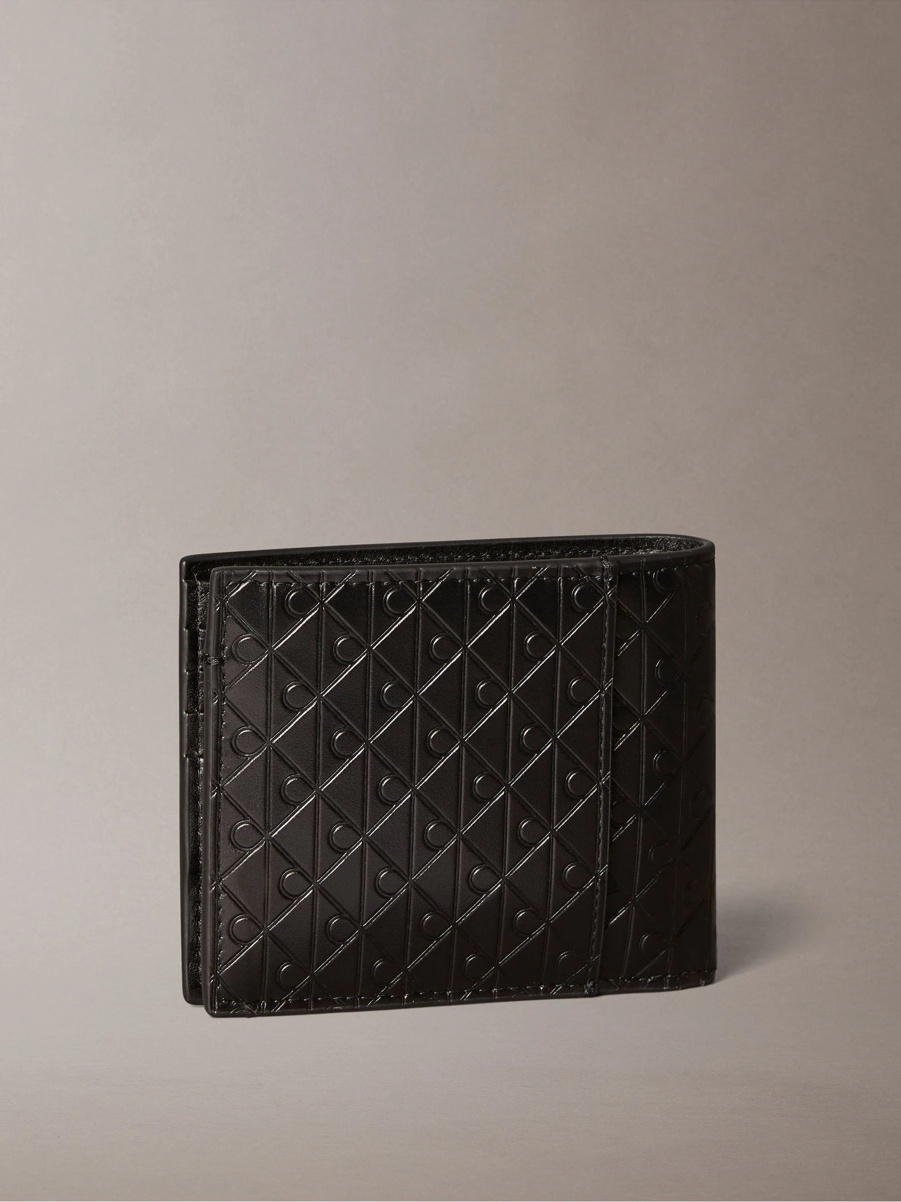 Calvin Klein Embossed Allover Monogram Bifold Wallet with Coin Pouch