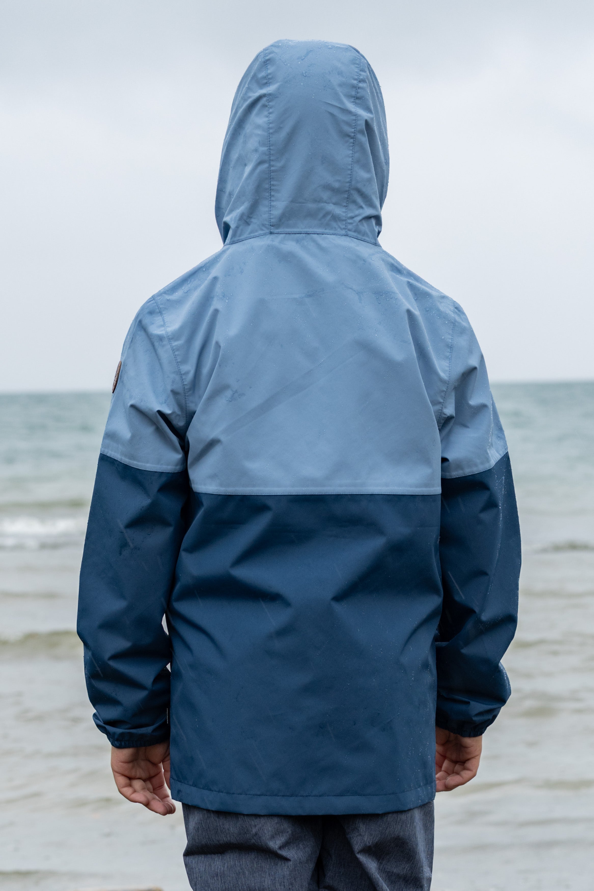 Kinder Regenjacke Travellight faded denim