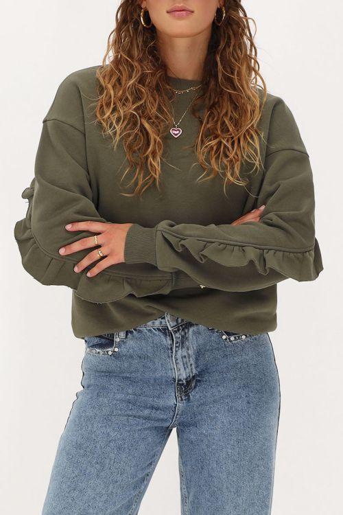 Donkergroene sweater met ruffle en patch
