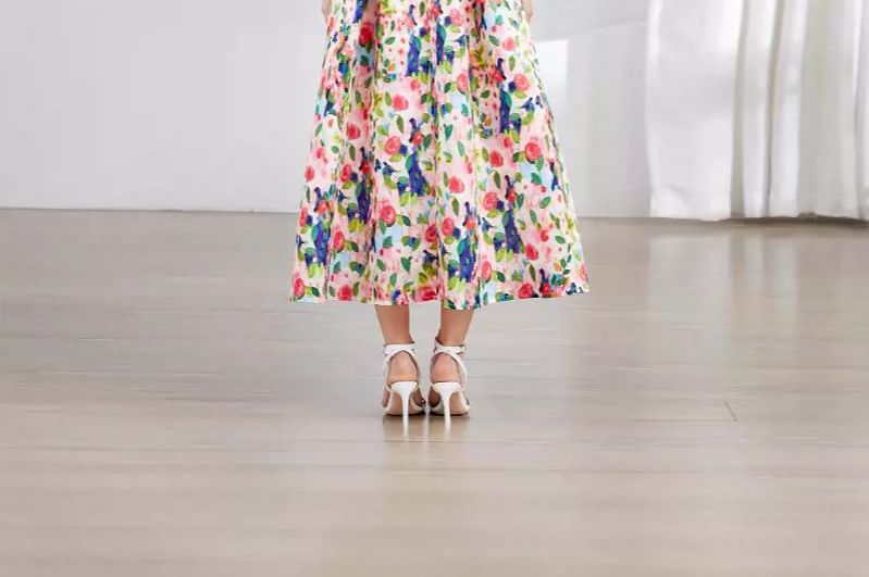 Aurora - Mouwloze maxi-A-lijnjurk met bloemenprint
