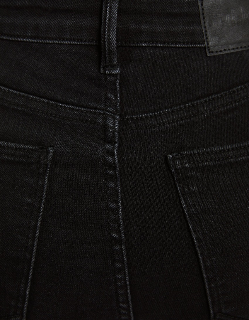 calça jeans skinny de cintura super alta