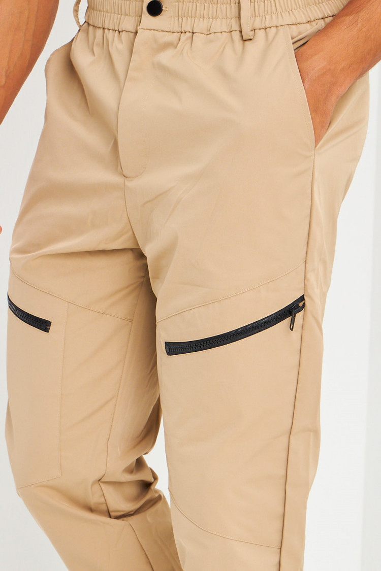 Pantalon de jogging beige foncé zippé