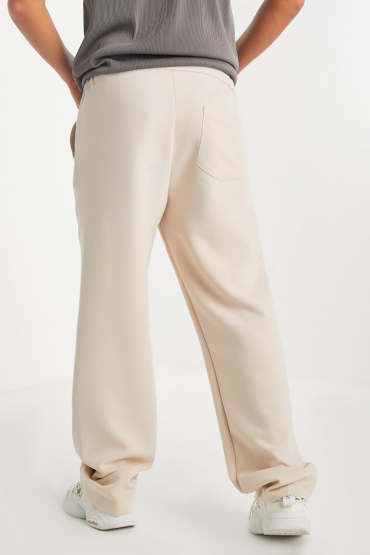 Pantalon beige coupe large
