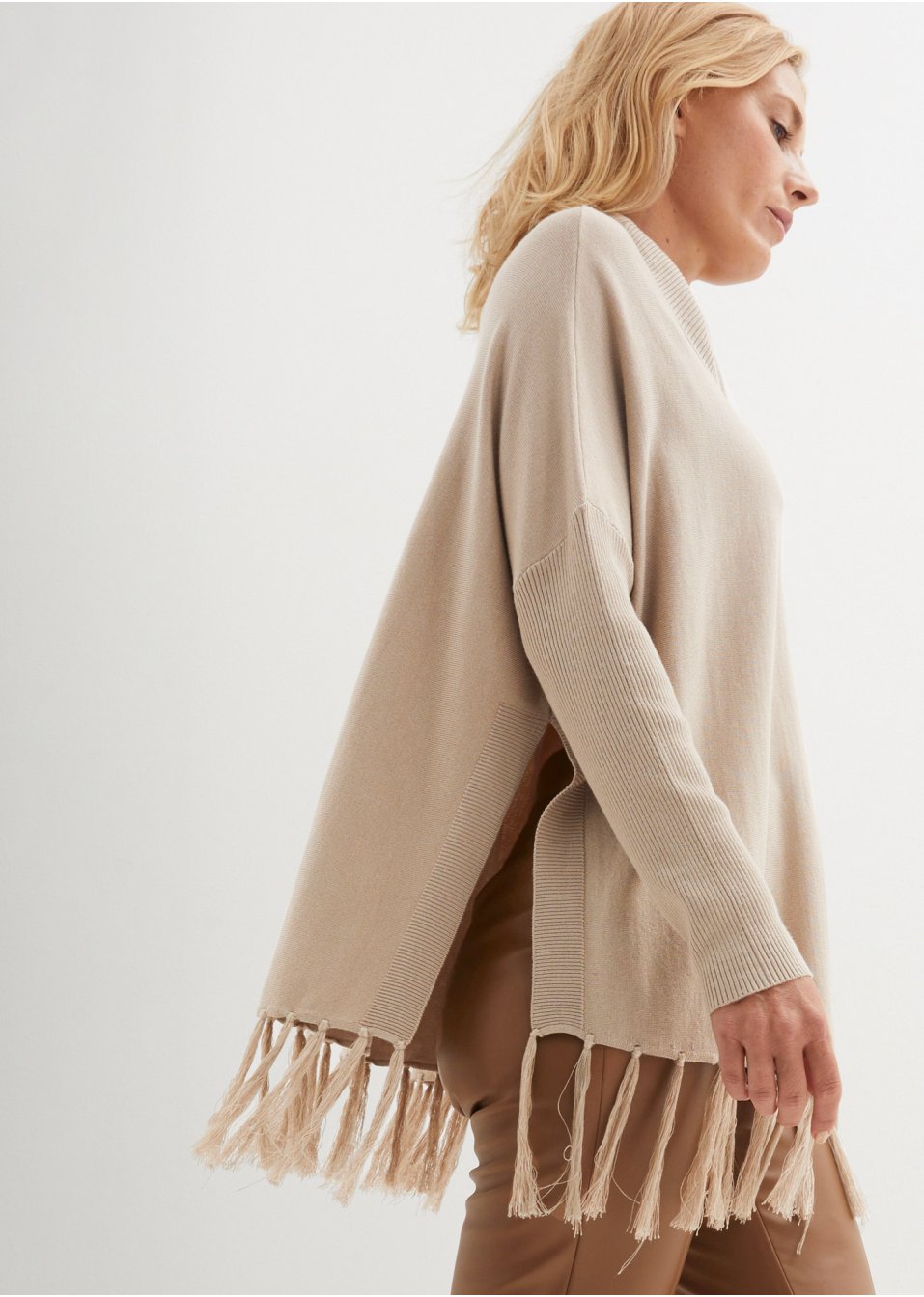 Pull avec franges à la base