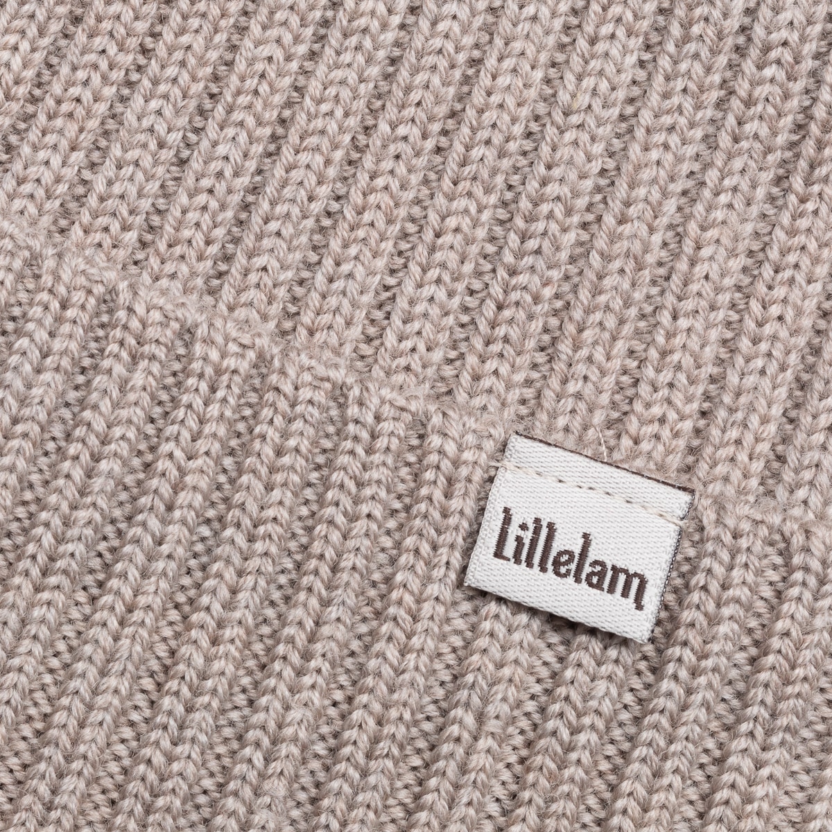 Lillelam Lue Ribb<br>Ribbestrikket lue i 100% merinoull!