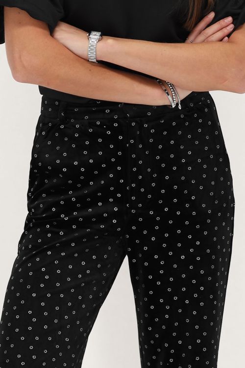 Zwarte velvet broek met zilverkleurige bloemen