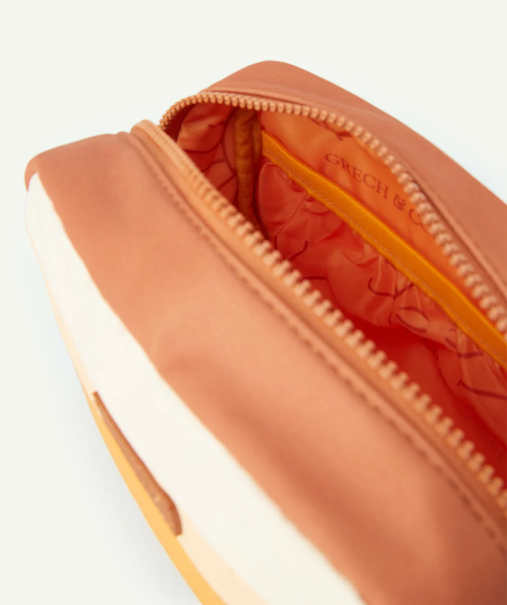 GRECH & CO.TROUSSE ORANGE IMPERMÉALE ENFANT EN FIBRES RECYCLÉES